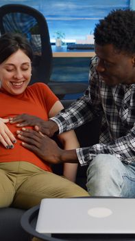 Interracial couple bonding while waiting for baby
