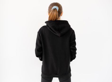 Back view of girl wearing hoodie
