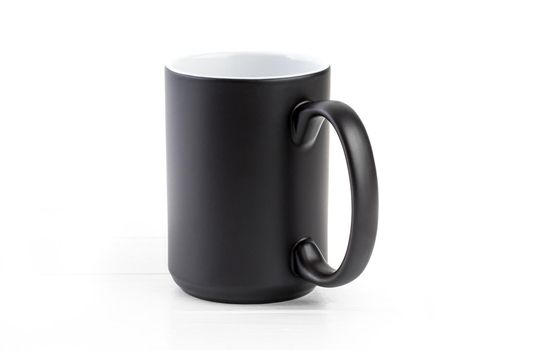 Black ceramic cup with white inside