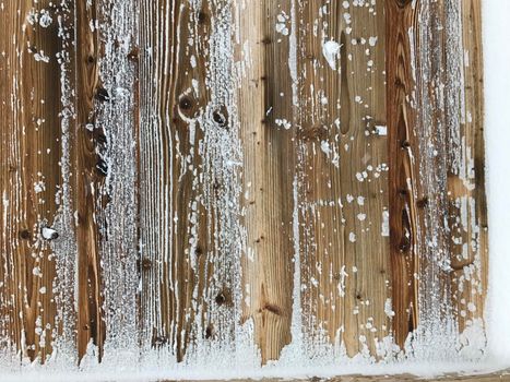 old wood covered with snow background