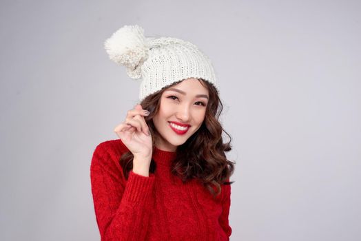 Portrait of beauty winter asian girl in knitted woolen clothing hat
