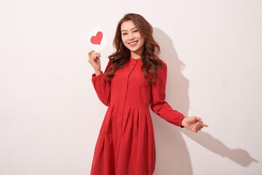 Lovely female with red heart. Celebration of Valentine day. Love concept