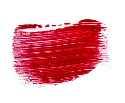 Stain swatch of a red matte lipstick on white background