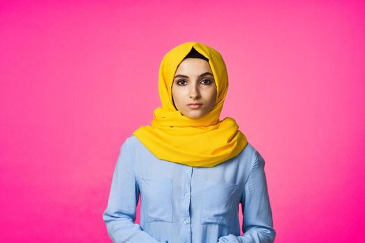 muslim woman in hijab posing fashion ethnicity pink background