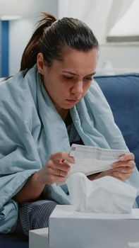 Person with disease infection analyzing package leaflet