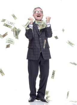 happy man standing in the rain of money. isolated on a white