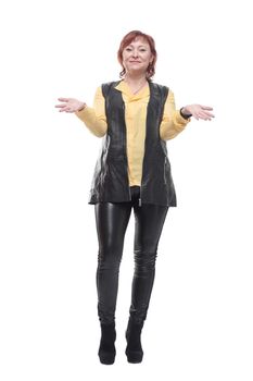 attractive mature woman in leather trousers and vest.