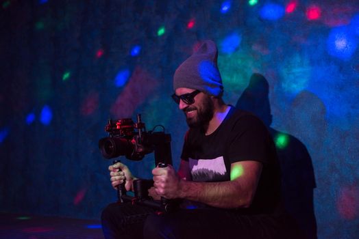 videographer in neon disco party