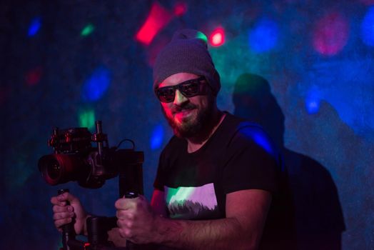 videographer in neon disco party