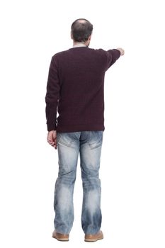 rear view. casual man in jeans and a jumper .