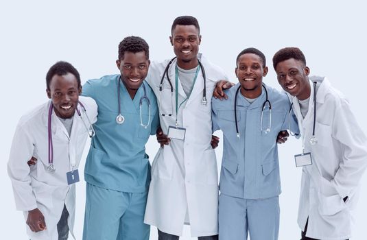 multinational group of doctors and interns standing together.