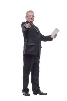 Happy business man using a touch pad against white background