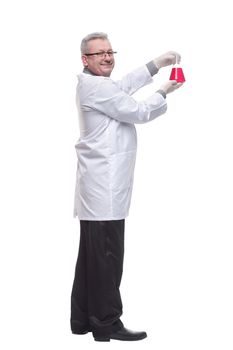 Side view of senior male researcher carrying out scientific research