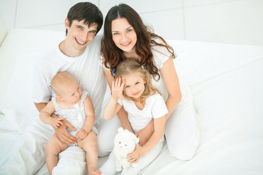 portrait of a happy family on a white background