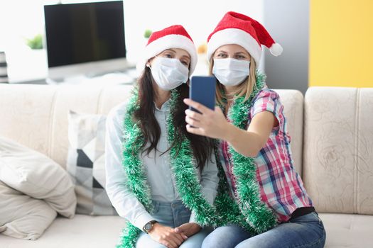 Best friends taking video congratulation with new year, holiday during pandemic