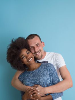 multiethnic couple laughing and hugging