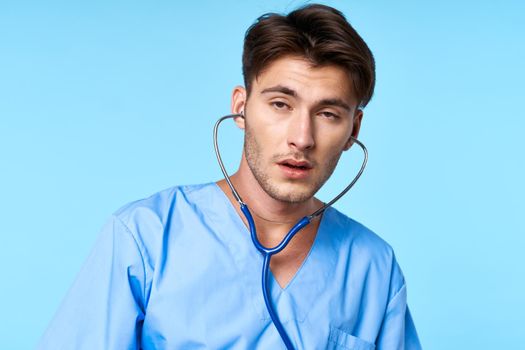 male doctor stethoscope examination work blue background