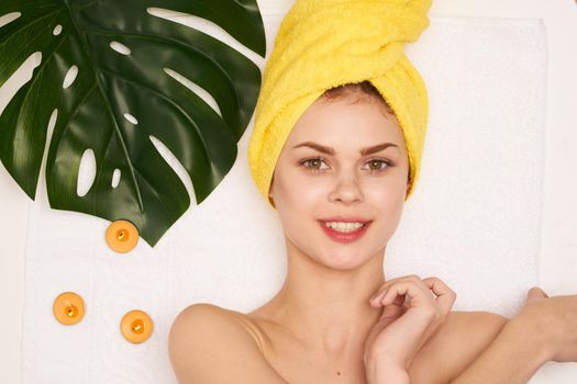 pretty woman spa treatments cosmetics beauty saloon light background