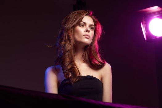 woman model black dress posing studio fashion hairstyle dark background