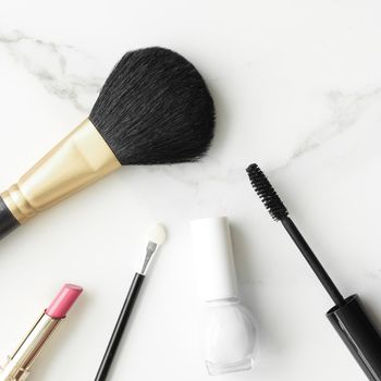 Make-up and cosmetics products on marble, flatlay background