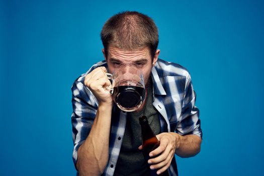 drunk man alcoholism problems emotions depression blue background