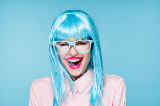 Glamorous woman blue wig makeup fashion posing
