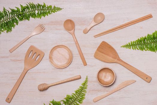 pile of wooden kitchen utensils photographed from above