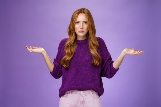 What your problem. Frustrated, confused and annoyed redhead girlfriend arguing cannot get clue why bother shrugging with raised hadns aside and puzzled expression, irritated with stupid quarrel