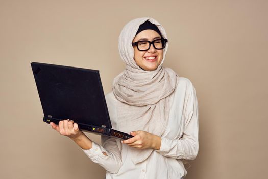 muslim woman with laptop work learning technology