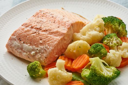 Steam salmon and vegetables, Paleo, keto, fodmap, dash diet. Mediterranean diet