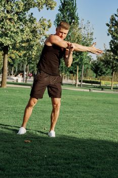 sports man in the park exercise fitness cardio