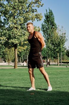 sports man in the park exercise fitness cardio