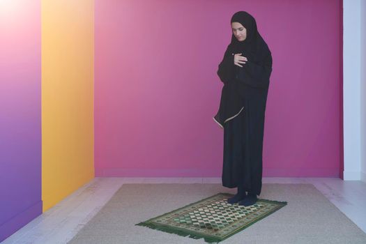 Muslim woman in namaz praying to Allah