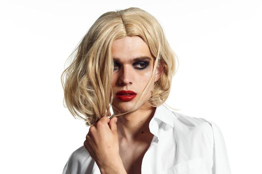 man in women's dress wig makeup posing bisexual