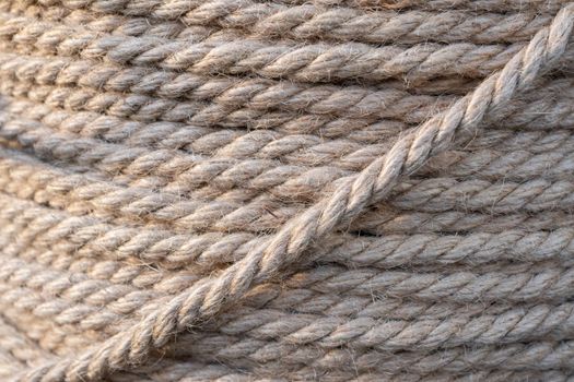 Background of jute rope on a reel close-up.