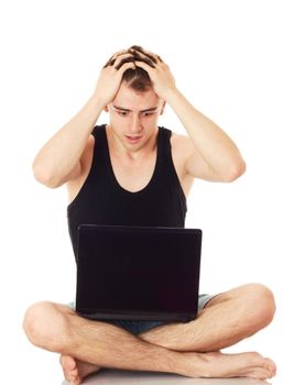 Man despairing with computer.