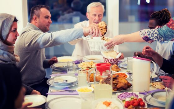 modern multiethnic muslim family having a Ramadan feast