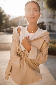 Portrait of a young fashion woman outdoors. High quality photo