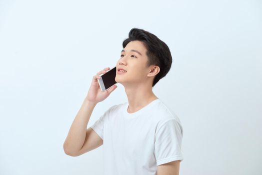 Young mantalking on cell phone