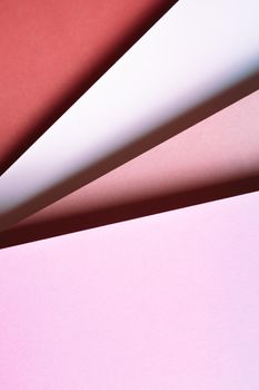 Abstract pink red orange and white and yellow color paper geometry composition background with shapes, minimalist shadows, copy space. Minimal geometric shapes. Colorful background concept