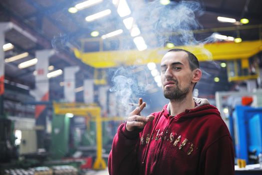 industry worker smoke cigarette