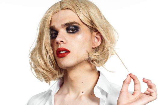 man in women's dress wig makeup posing bisexual