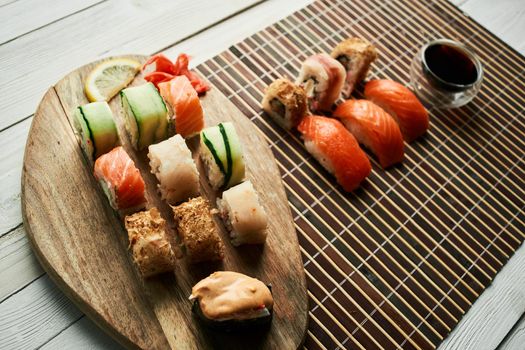 sushi set soy sauce chopsticks japanese cuisine traditional food. High quality photo