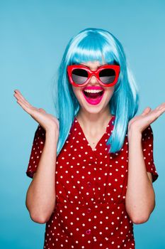 pretty woman fashion blue wig posing sunglasses. High quality photo