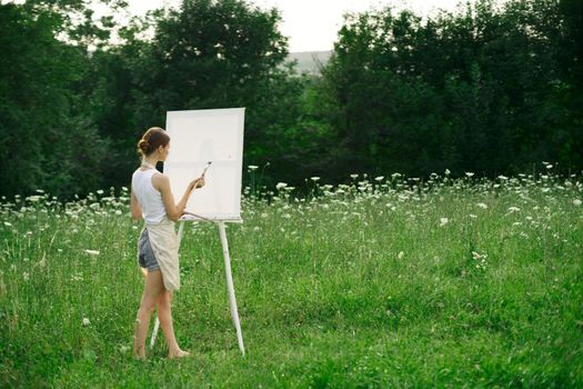 woman artist drawing nature picnic hobby creative. High quality photo