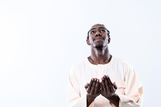 african man pray to Allah