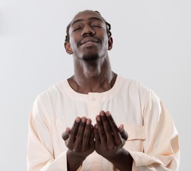 african man pray to Allah