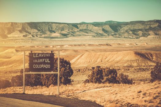 Leaving Colorful Colorado Utah Border Sign