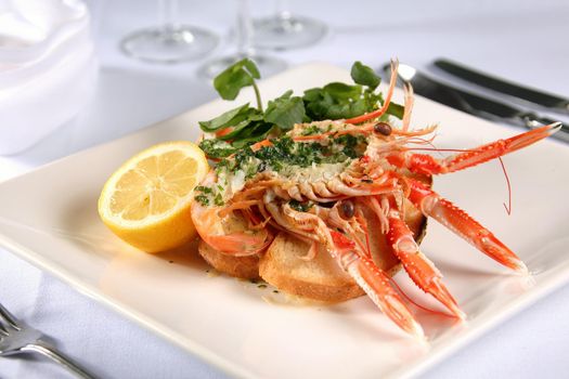 Langoustine Norway lobster Dublin Bay prawn scampi with herb butter lemon and salad