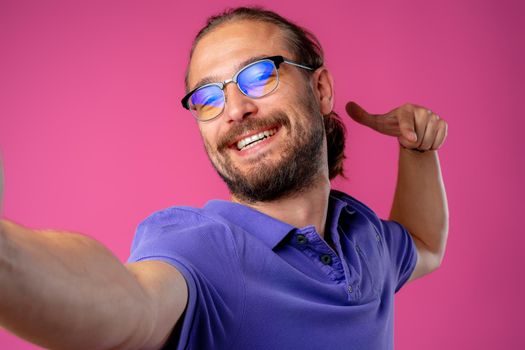 Portrait of a funny nerd man in glasses